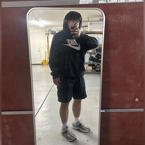 Nike Black Hoodie with White Swoosh Logo - Casual Streetwear